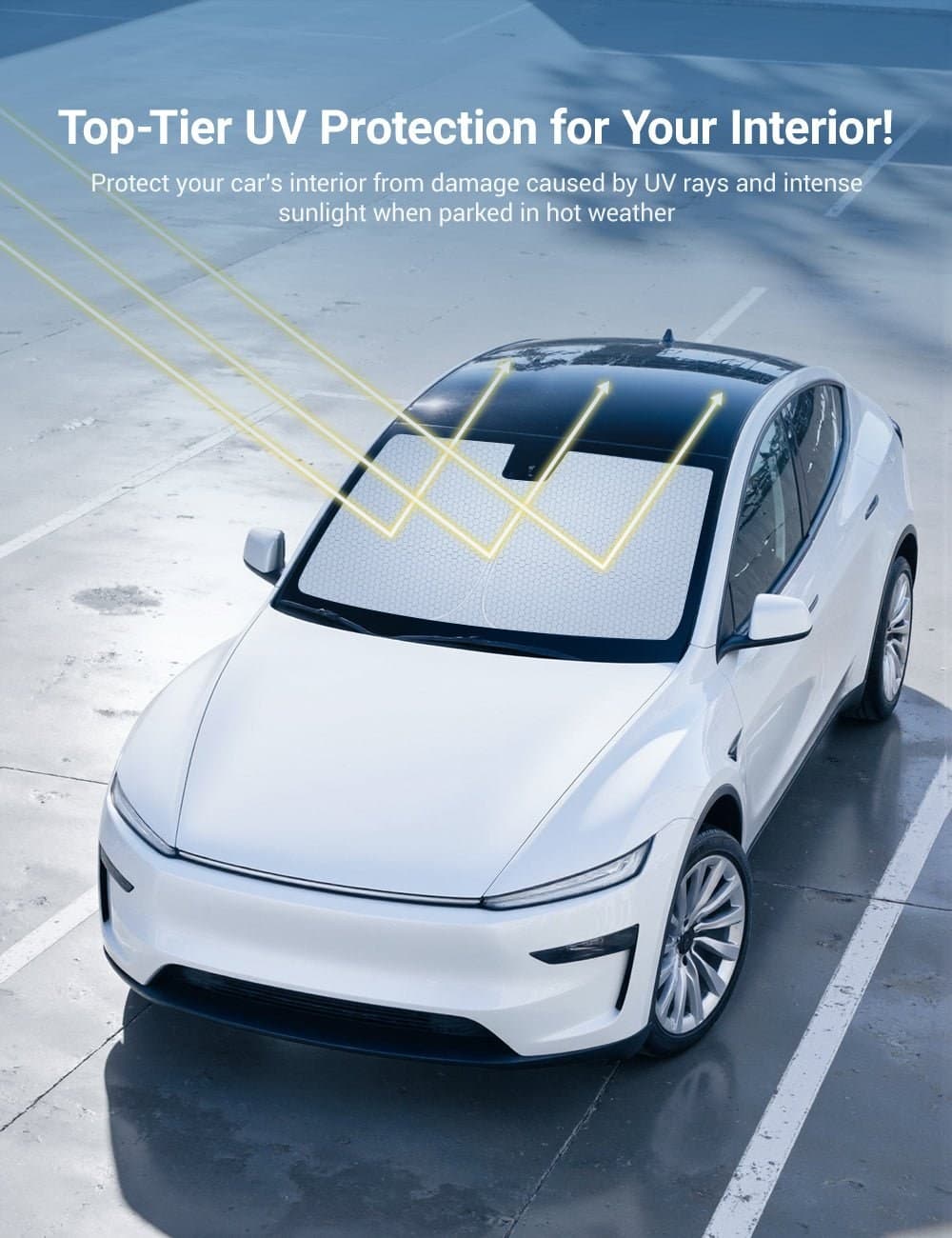 Tesla Model Y Juniper estacionado al sol con parasol de parabrisas puesto